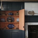 Blue and white Delft ceramic dishes as displayed in the 18th-century "common parlor" at the Wyckoff farmhouse